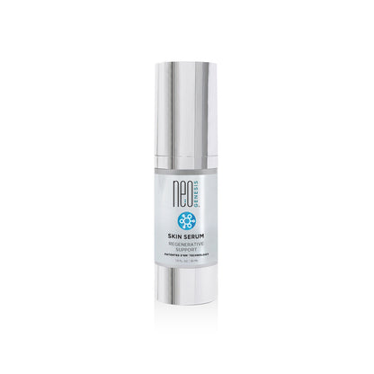Silver-capped bottle of NeoGenesis Skin Serum, labeled "Regenerative Support." The sleek, minimalist design conveys a sense of luxury and care.
